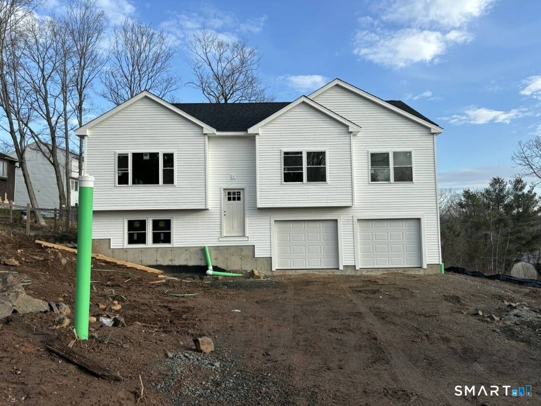 This Under Construction raised ranch offers an opportunity to build your own home with personal touches.