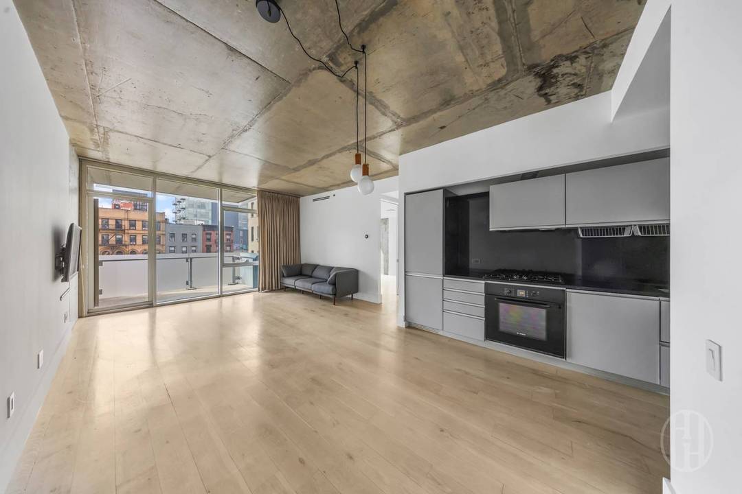 Welcome to Residence 503 at 115 Norfolk Street, a loft style one bedroom in the boutique Norfolk Atrium condominium, located in the heart of the Lower East Side.