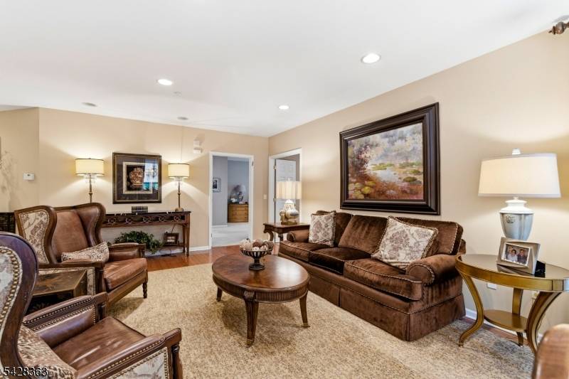 Welcome to 2104 Johnson Drive, located in the sought after 55 community of Fox Hills in Rockaway.