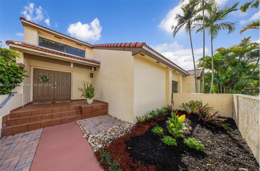 Welcome to this stunning, modern remodeled townhome in the heart of Miami Lakes !