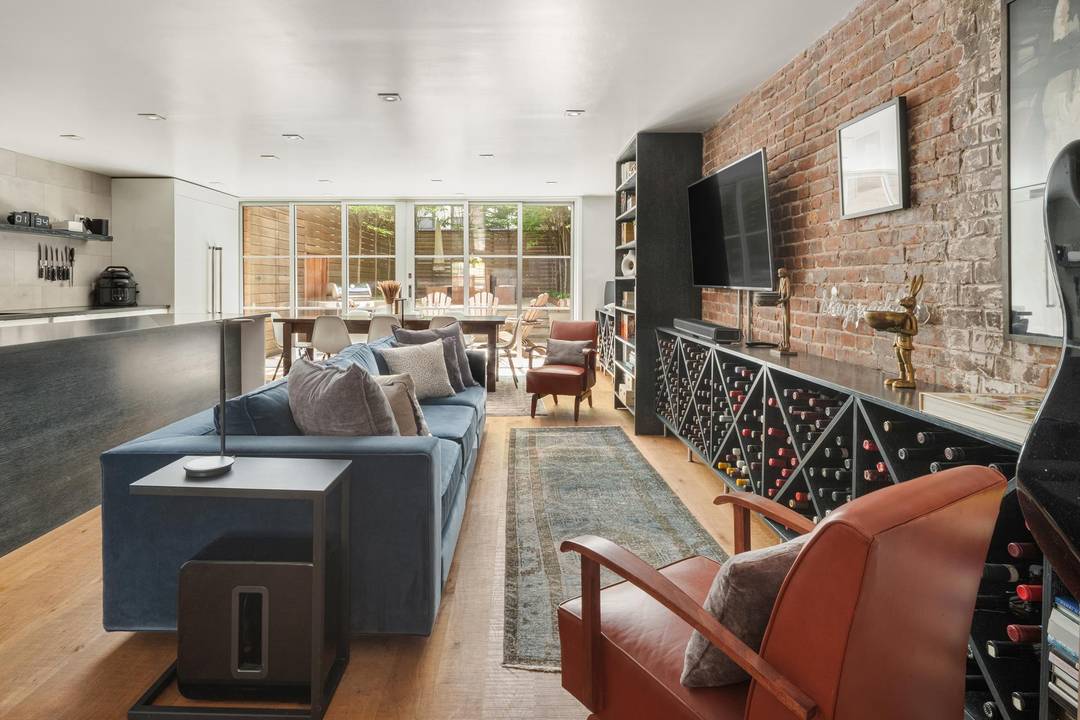 Located on a quintessential tree lined quiet Turtle Bay block, this architecturally re imagined and custom crafted floor thru townhouse 1 bedroom 1 bathroom home with a backyard is waiting ...