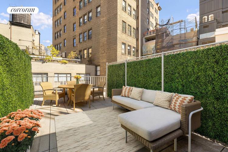 Located on the penthouse level of the historic Cast Iron Building, this bright two bedroom duplex features a large private terrace and a flexible layout.