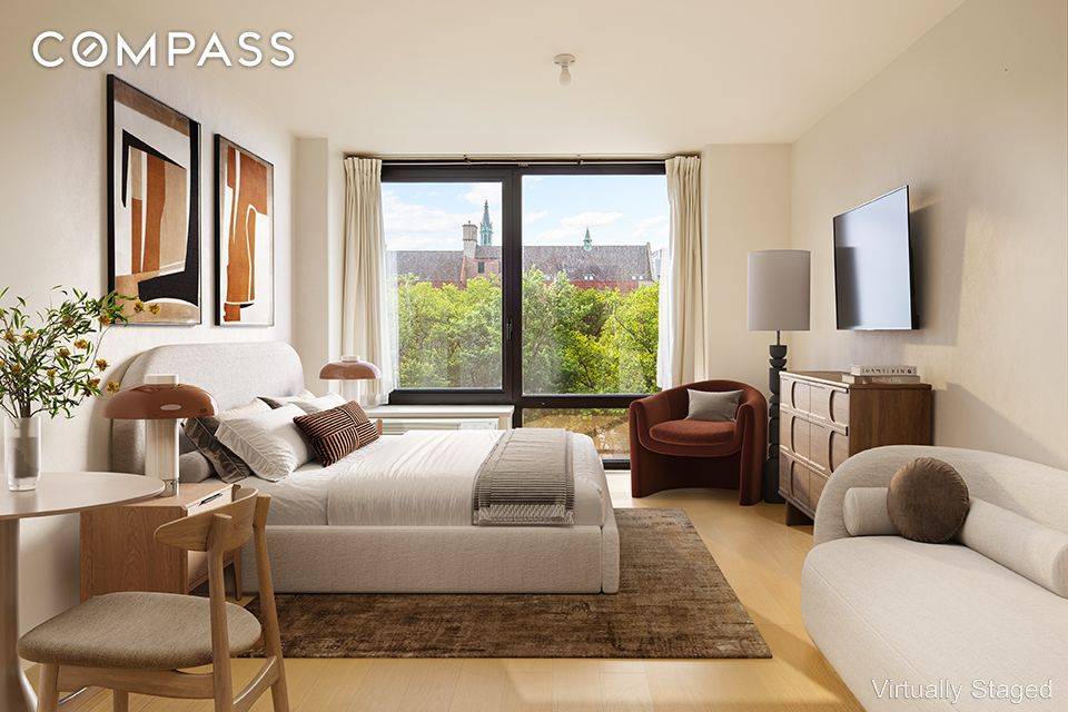 Serene and tranquil studio with excellent daylight from unobstructed views of the park.