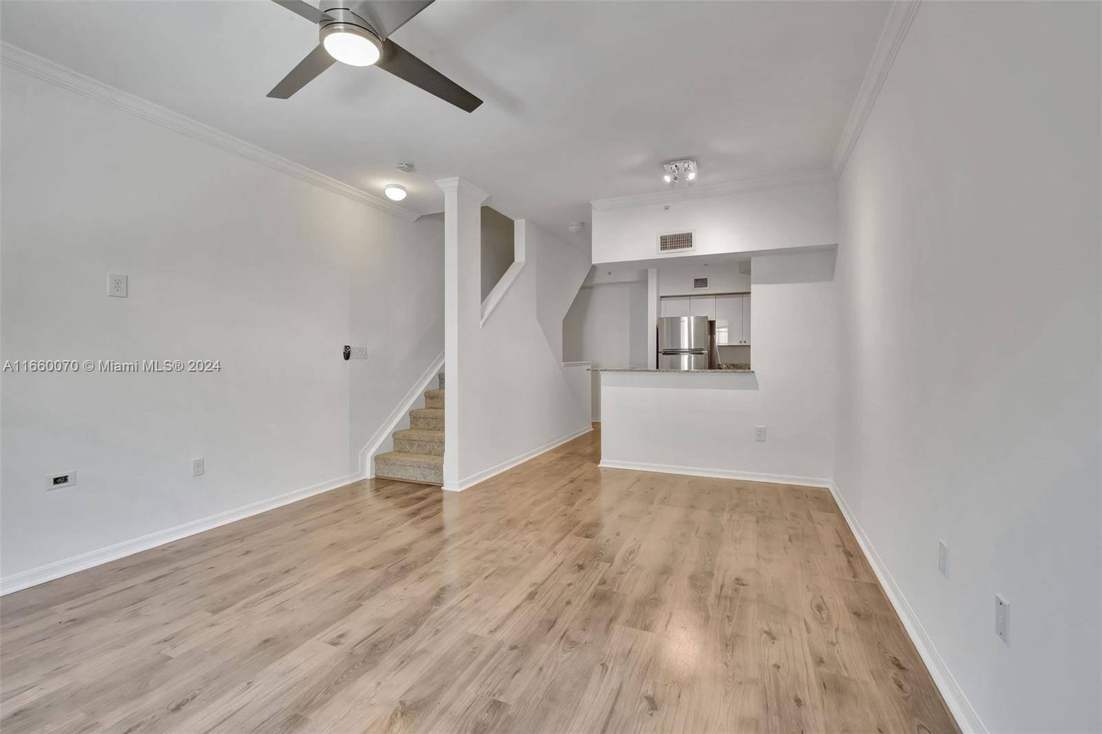 BEAUTIFUL RENOVATED 3 LEVEL TOWNHOUSE IN DESIRED COMMUNITY AVENTI OF AVENTURA.