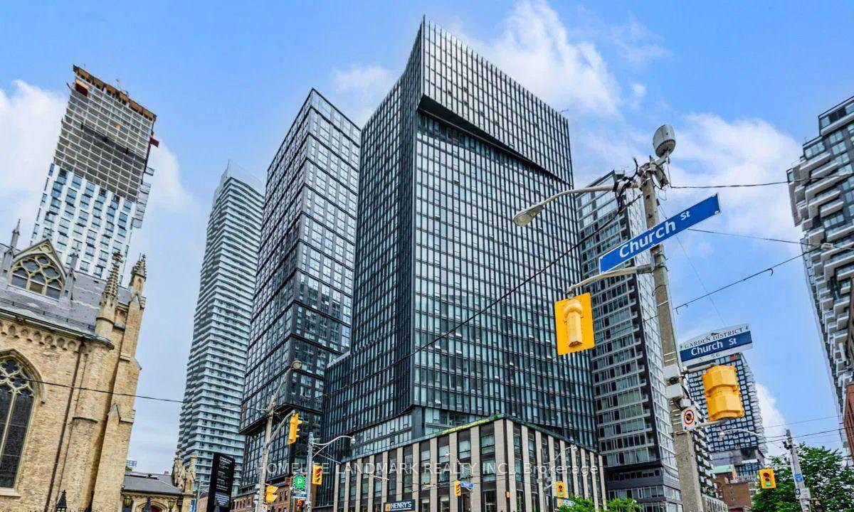 Toronto Core Downtown Fleur Condo developed by Menkes, Great Open Concept Layout Combines Kitchen With Dining And Living Area, Modern Kitchen With Built In Appliances.