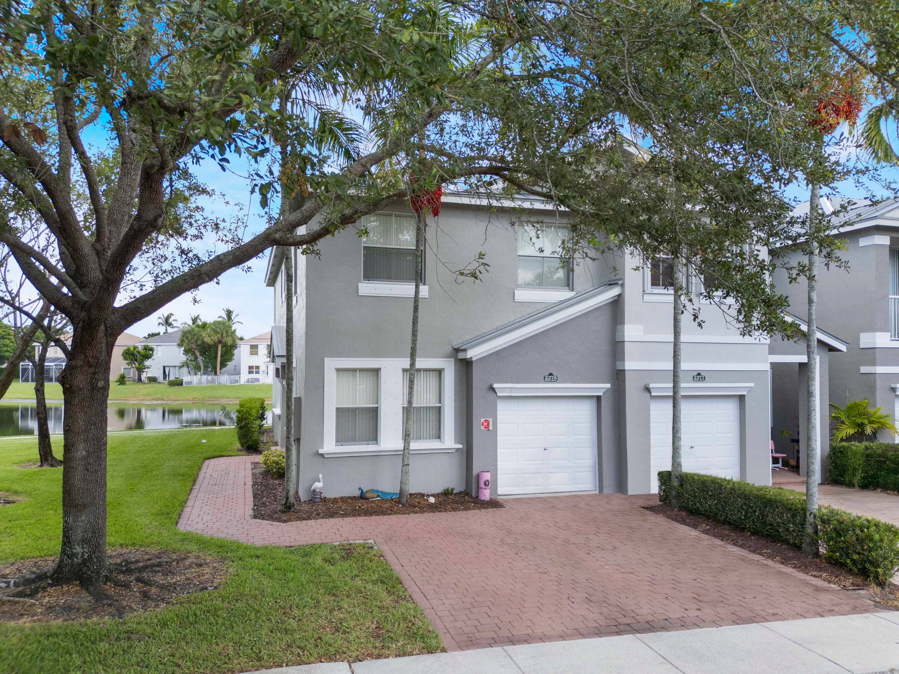 Spacious 4 Bed, 3 Bath Townhouse with Lake View in the Desirable Shoma Home !