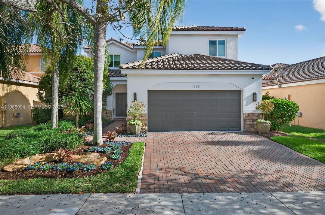 Welcome to this beautifully updated, turnkey residence in the highly sought after guard gated community of Savanna in Weston.