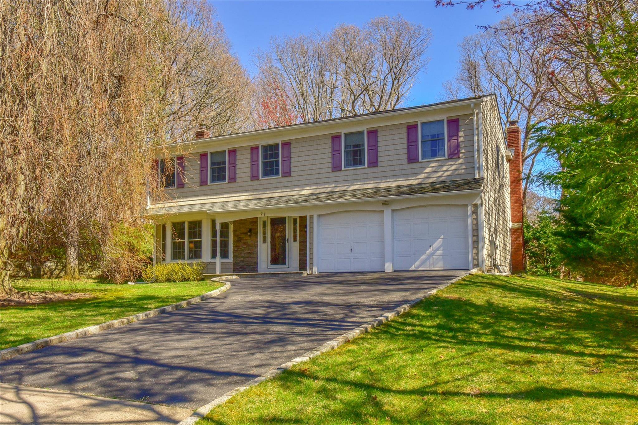 Impeccably maintained and truly move in ready, this stunning home is situated on a peaceful cul de sac, offering just shy of an acre of private, serene property.