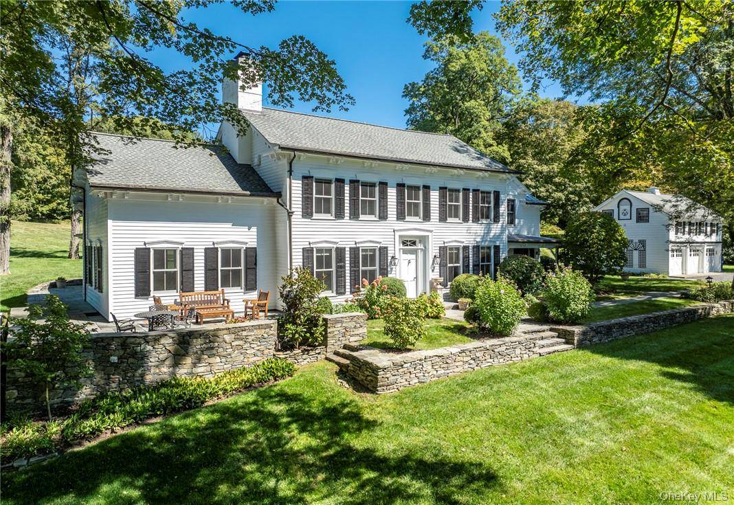 Sited on one of the most beautiful parcels in the Hudson Valley, this idyllic estate on a quiet country lane offers endless possibilities with the features of a mini resort.