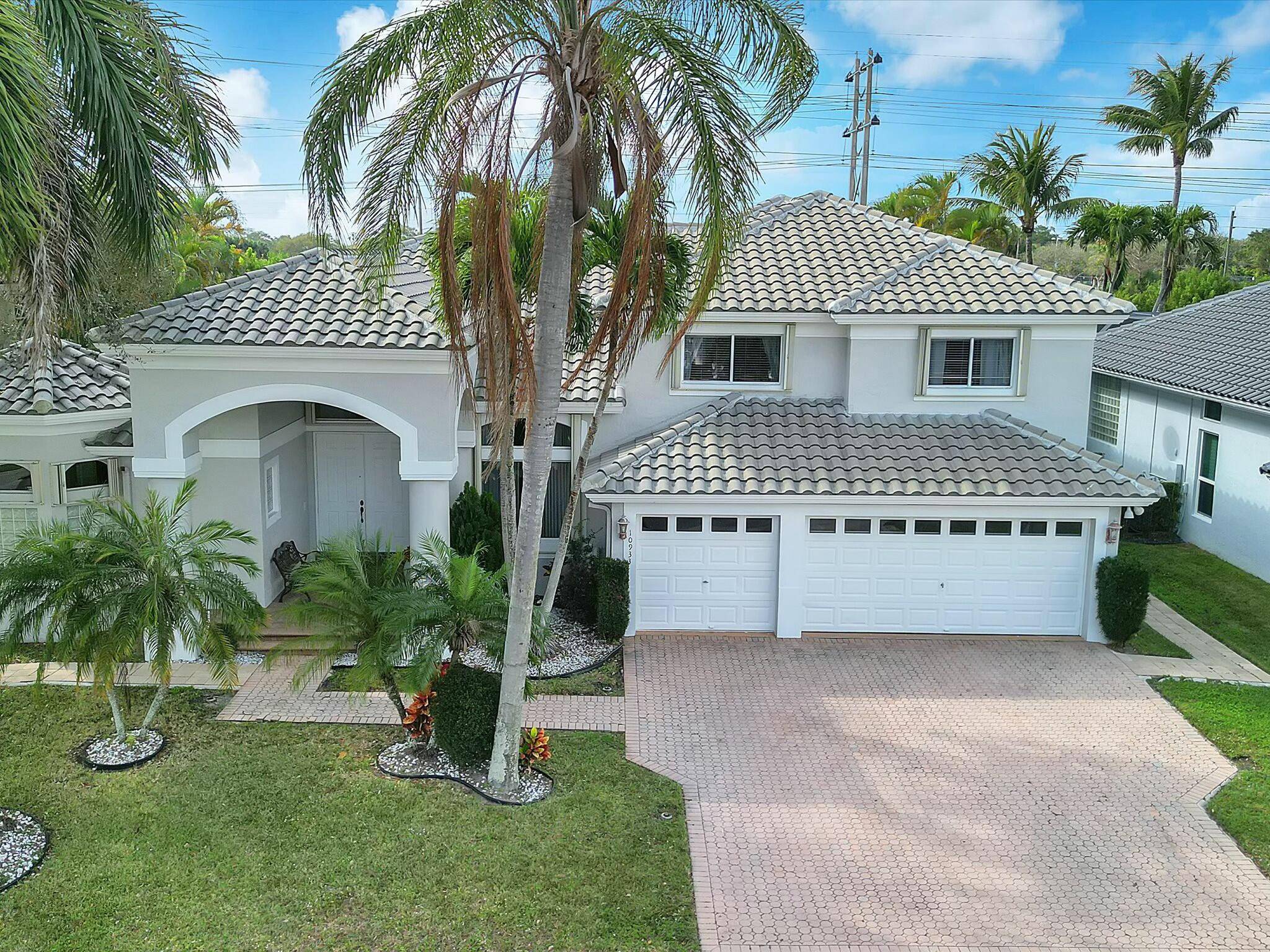 Fabulous 5 bedroom 3 bathroom 3 car garage Palm Beacher model located in the highly desirable gated community of Boca Isles South.