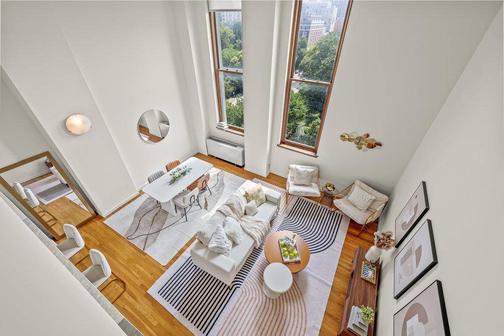 Welcome to this extraordinary triplex residence in the historic Rutherford Place Condominium, offering the ultimate in townhouse style living with the convenience of full service amenities.