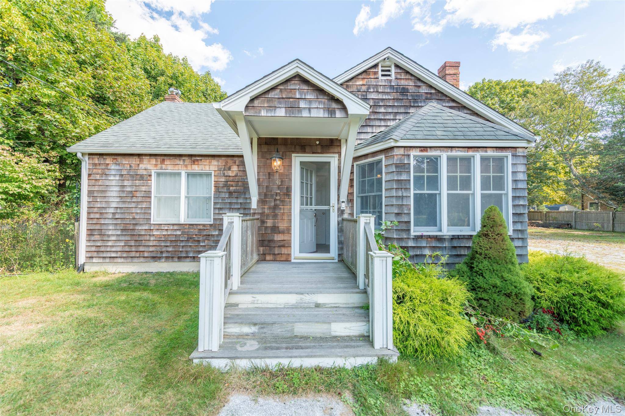 Welcome to this truly unique Craftsman style expanded Cape in the desirable East Moriches School District, with school choice options for your loved ones.