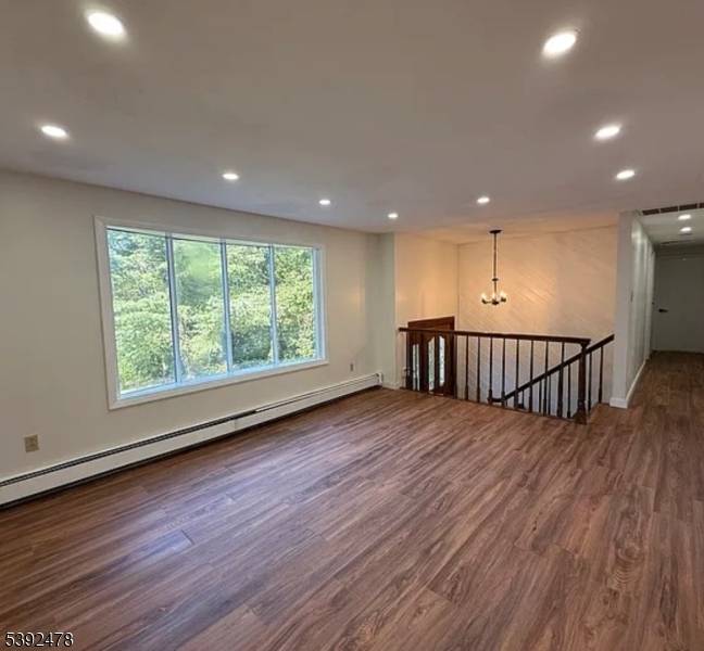 Discover lakeside luxury in this stunning, fully renovated 5 bedroom, 2 full bath single family home nestled in the heart of highly sought after Lake Hopatcong.