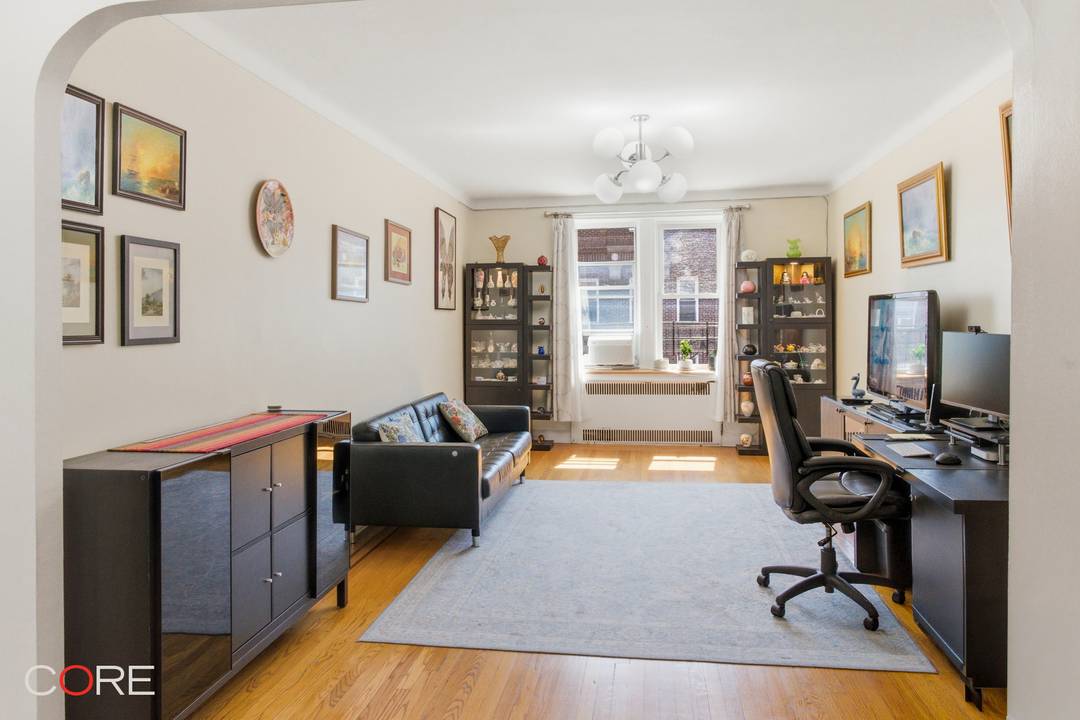 This expansive two bed, two bath top floor unit seamlessly blends classic pre war character, such as arched doorways and hardwood floors, with thoughtful updates, creating a warm and welcoming ...