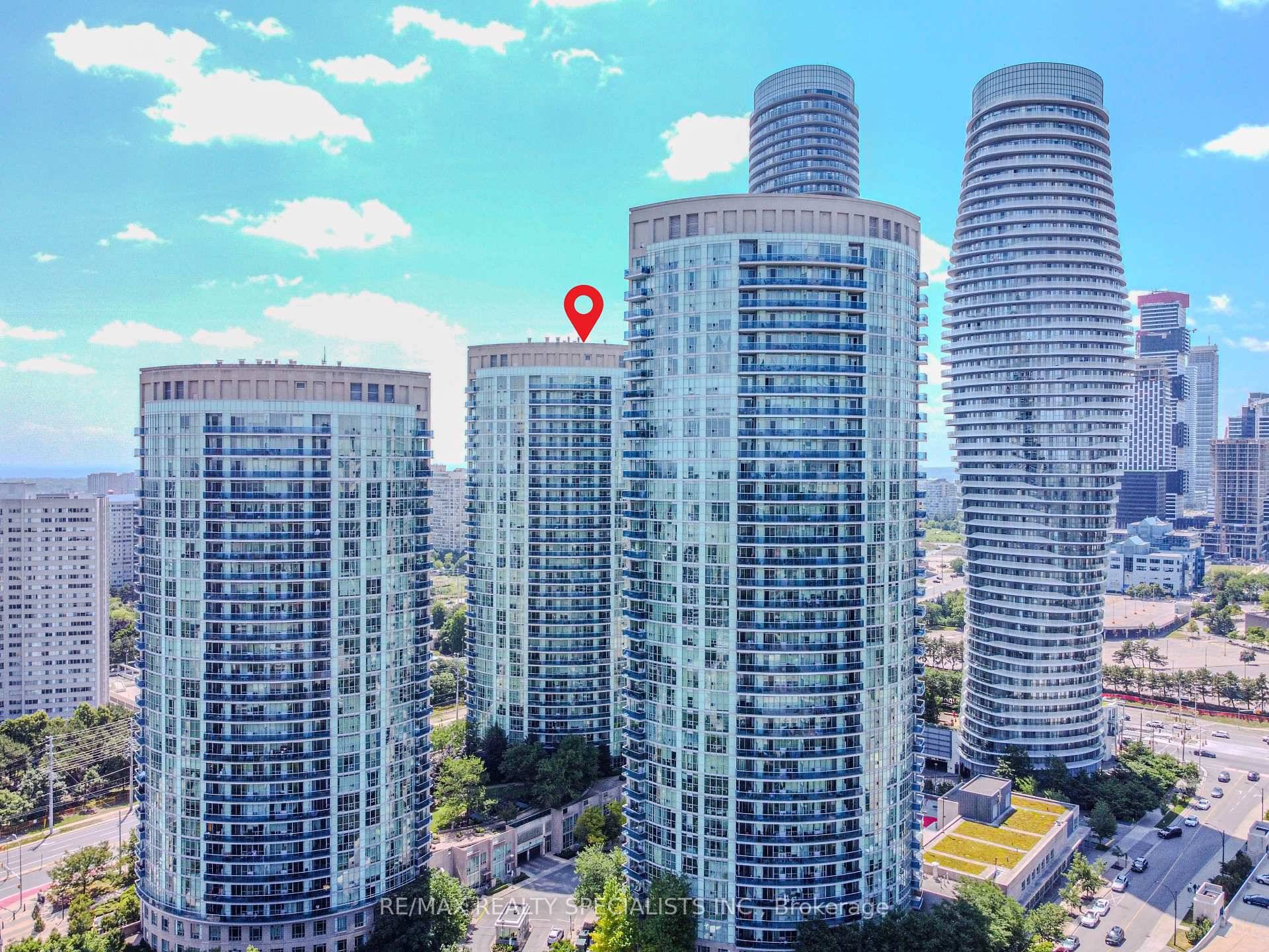 Welcome to 1206 at 70 Absolute Ave, a sun drenched 2 bedroom den, 2 bath corner suite in the heart of Mississauga.