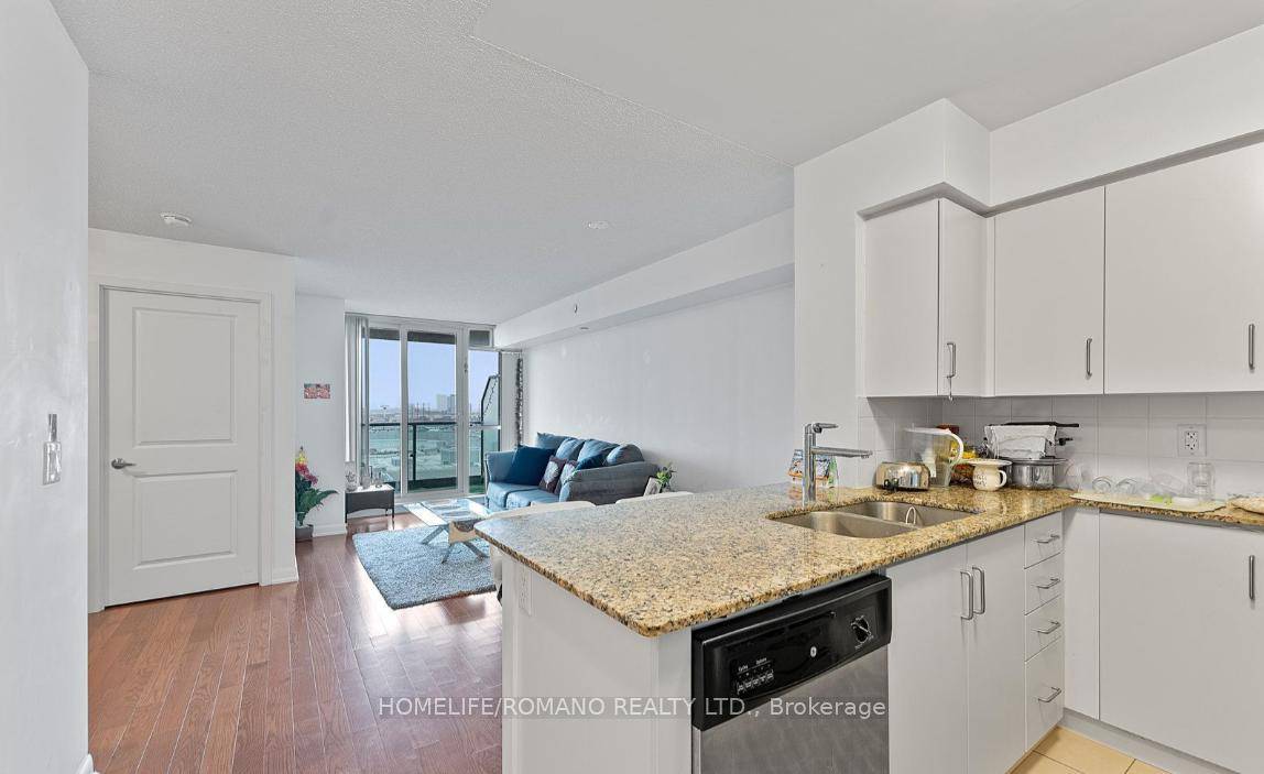 This one bedroom plus den condo, located in the sought after One Sherway Tower Three at 215 Sherway Gardens Road, was built by Menkes.