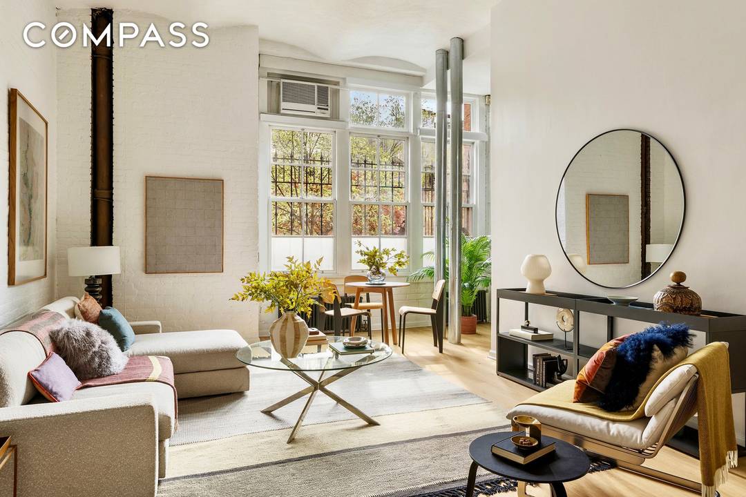 Experience the rare intersection of 19th century industrial heritage and contemporary sophistication in this meticulously reimagined barrel vaulted loft.