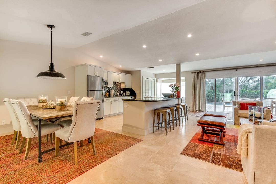 This tastefully furnished 3 bedroom, 2 bathroom home with a pool is nestled within the prestigious gated community of Palm Beach Polo Golf and Country Club.