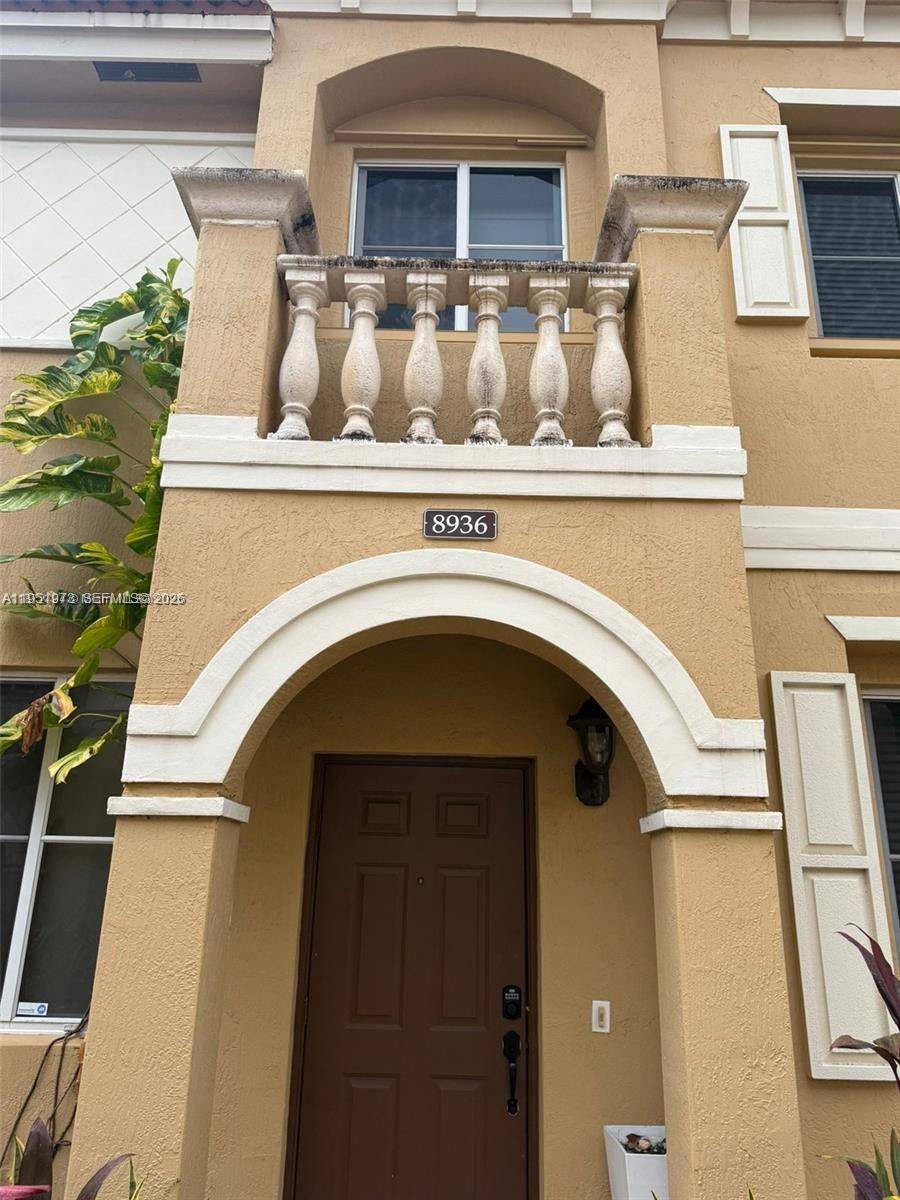 Discover this beautiful townhouse in the desirable Village Walk of Miramar.