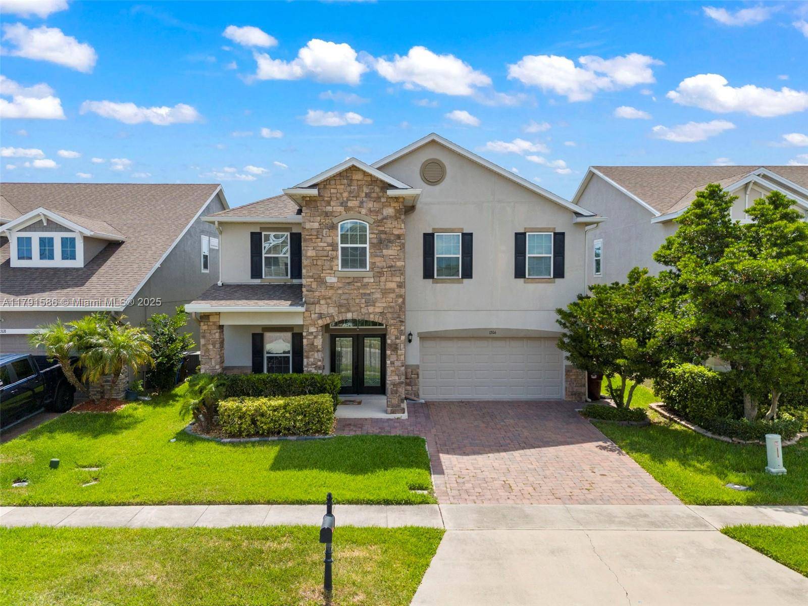 NEW 2025 ROOF ! Experience the best of FL living in this expansive 5 bedroom, 3.