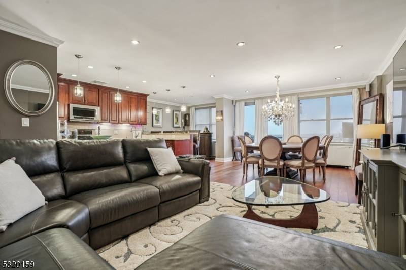 Discover luxury, comfort, style, and convenience in this beautifully appointed penthouse 2 bedroom, 2 bathroom condo with higher ceilings with recessed lighting at the coveted Executive House in Hackensack.