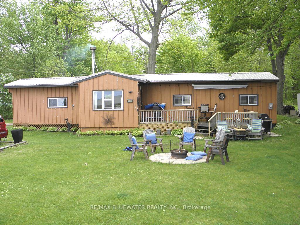 Lake Front 3 season updated cottage on 90 x 145 foot lot facing west over Lake Huron.