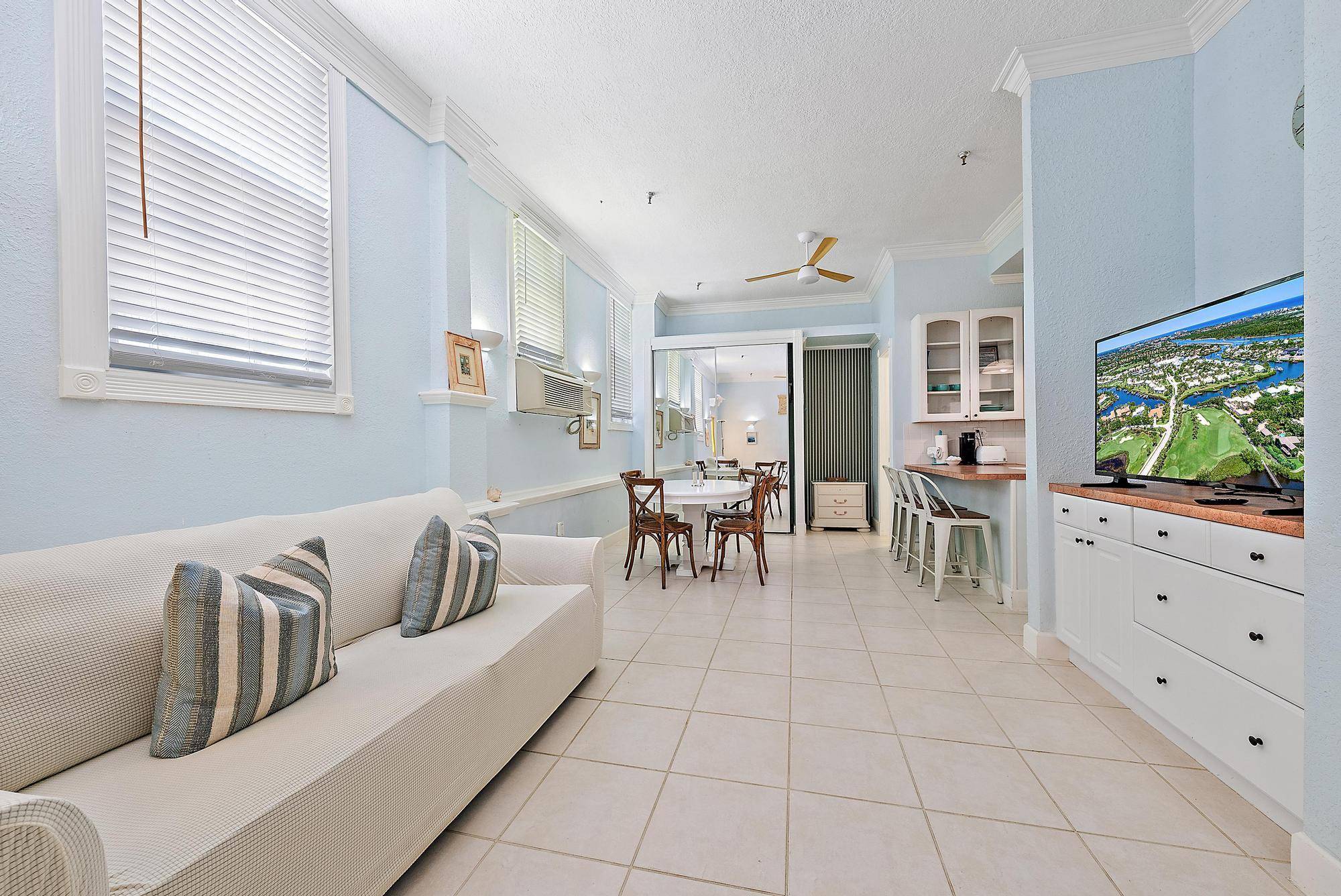 Rarely available studio garden apartment in the iconic Palm Beach Hotel, offering private access to the pool deck and patio making it the ultimate retreat.