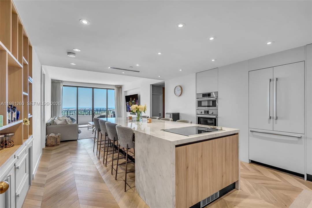 Fully renovated high floor residence in Emerald Bay at Key Colony featuring desirable south exposure with beautiful water views stretching from east to west and exceptional natural light.