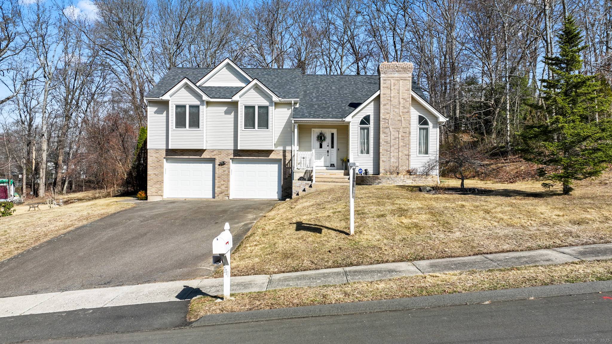 Welcome to this beautiful contemporary ranch split level home nestled in one of Watertown's most sought after subdivisions !