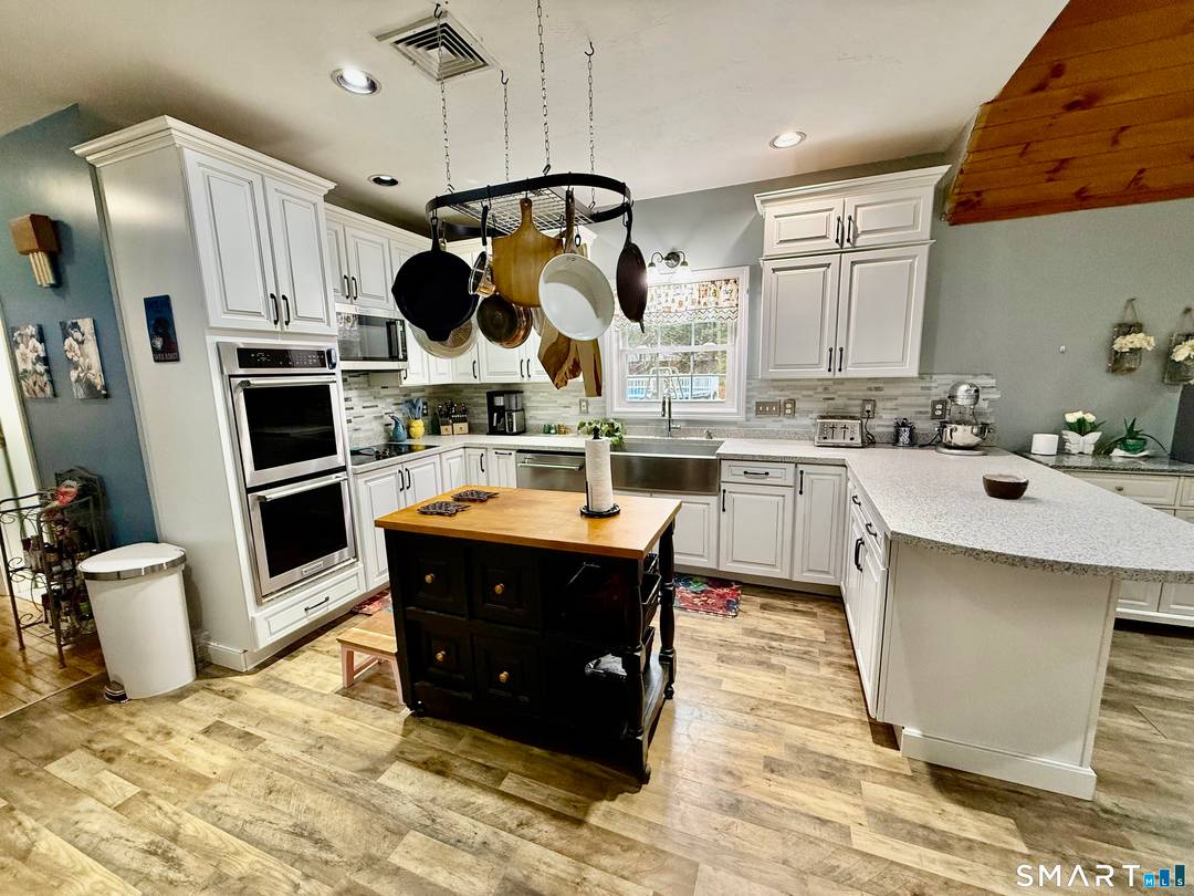 Set back from the road on 2 private acres, this updated Putnam CT Colonial offers 2, 646 sq ft of main living space plus a 980 sq ft partially finished ...
