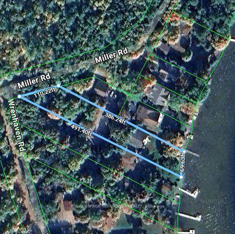 This Exquisite Year Round Waterfront Home On Cameron Lake Offers Unparalleled Lakeside Living !