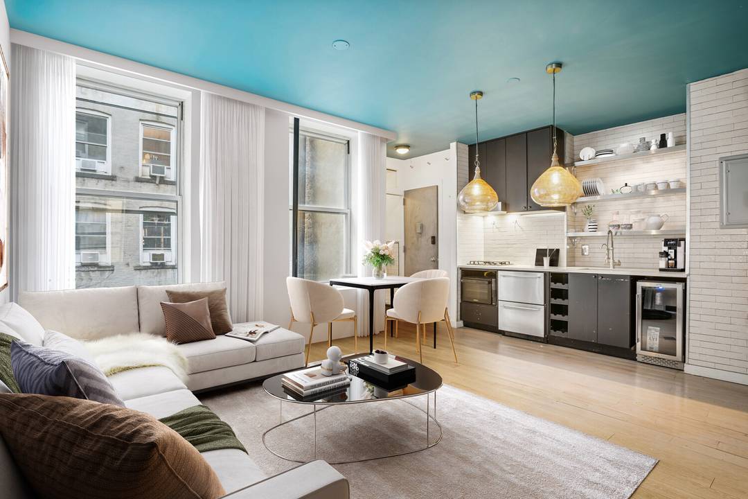 Tucked along a peaceful, tree lined block in the heart of SoHo, this beautifully curated junior one bedroom home blends modern design with classic downtown charm.