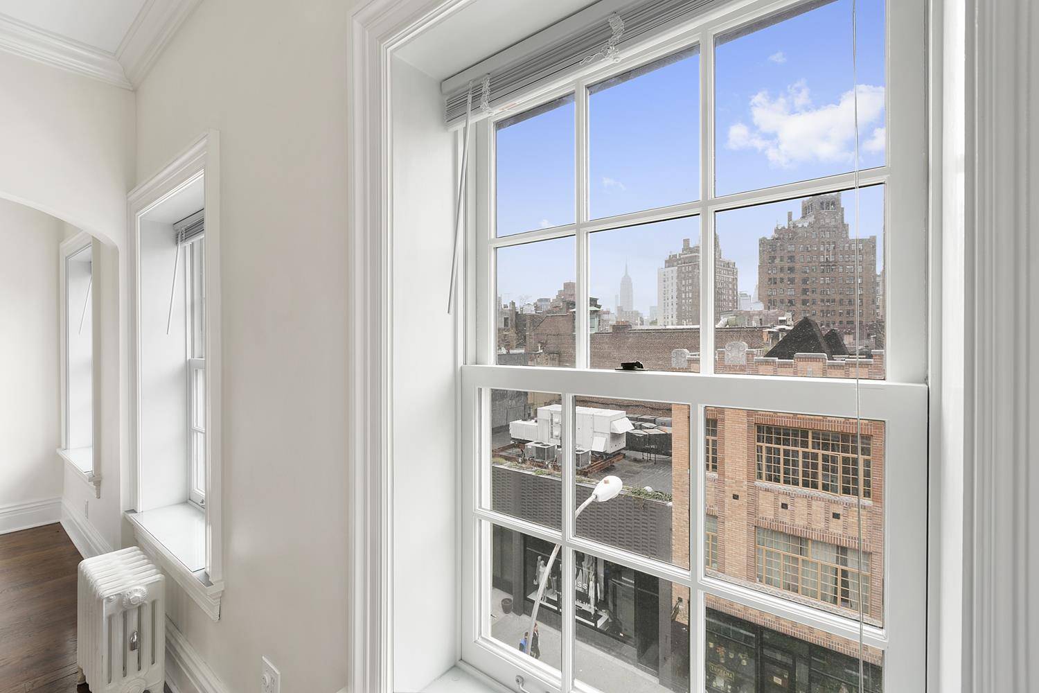 EMPIRE STATE VIEWS This stunning top floor one bedroom 3 flights up in a boutique Townhouse has iconic views of the village and city.