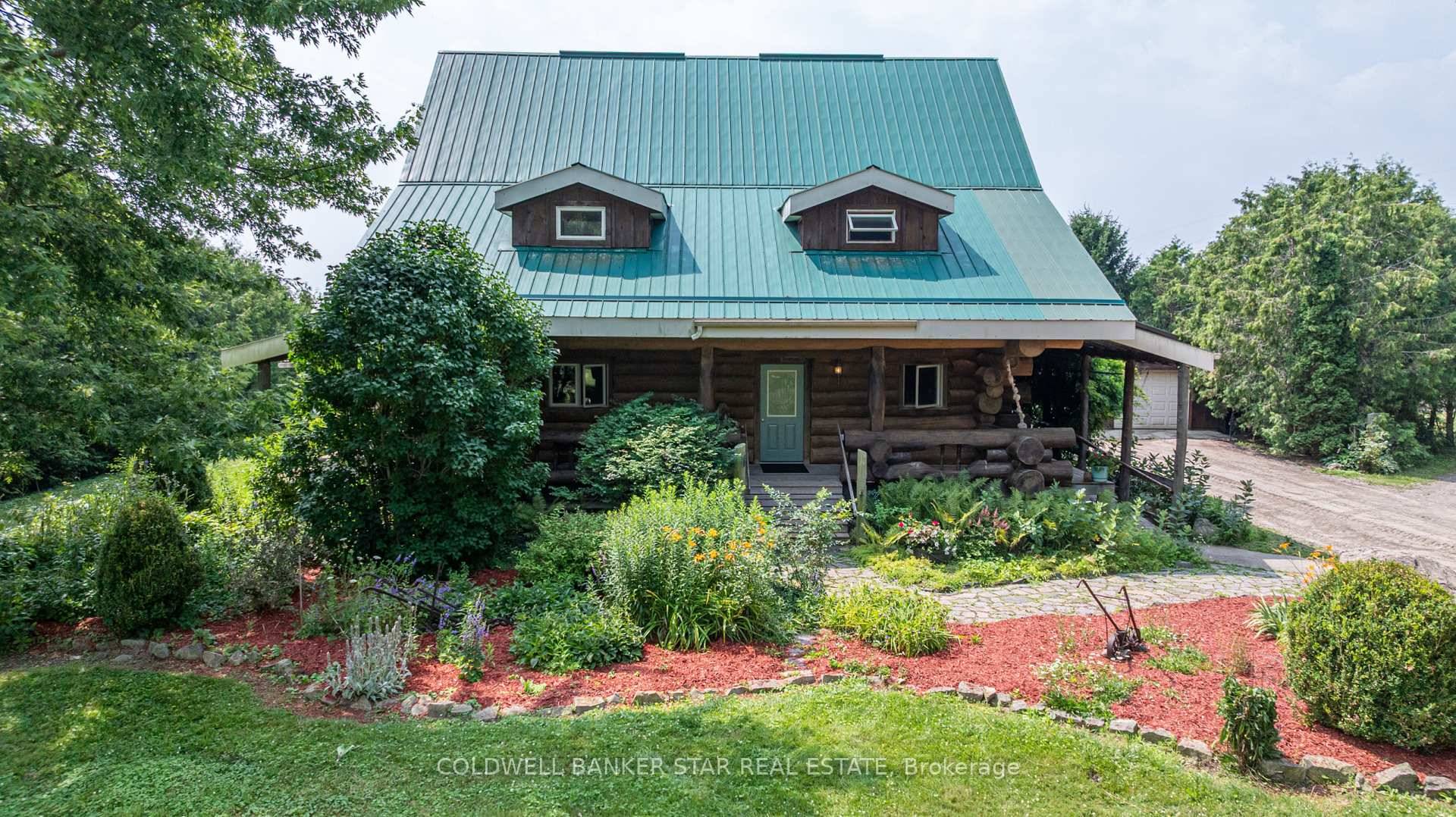 Welcome to 42431 Ron McNeil Line a beautiful 3717 sq ft one of a kind true scribed log home, located on a treed 2.
