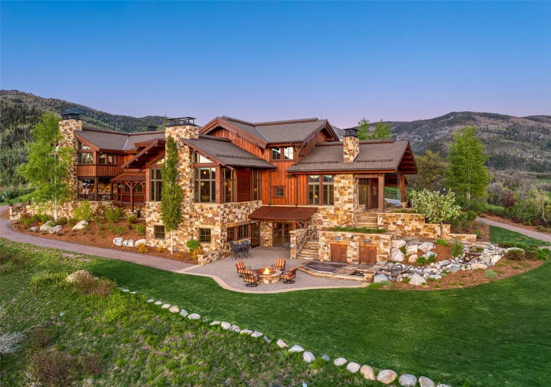This spectacular home in Alpine Mountain Ranch began with classic mountain Timber Frame construction where the beauty of the craftsmanship and exposed beams are a natural companion to this Rocky ...