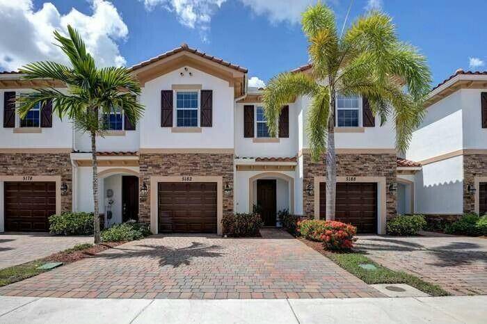 Discover this beautifully maintained townhouse at 5182 Ashley River Road, perfectly situated in the heart of West Palm Beach !