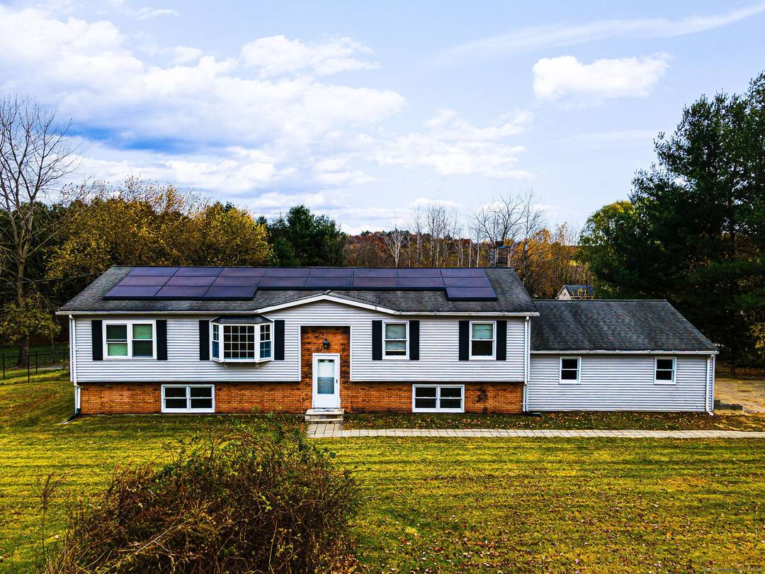 There's such a great layout in this spacious contemporary raised ranch !