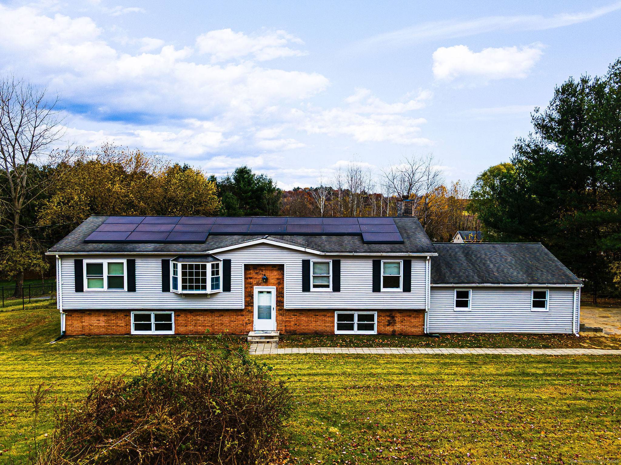 There's such a great layout in this spacious contemporary raised ranch !