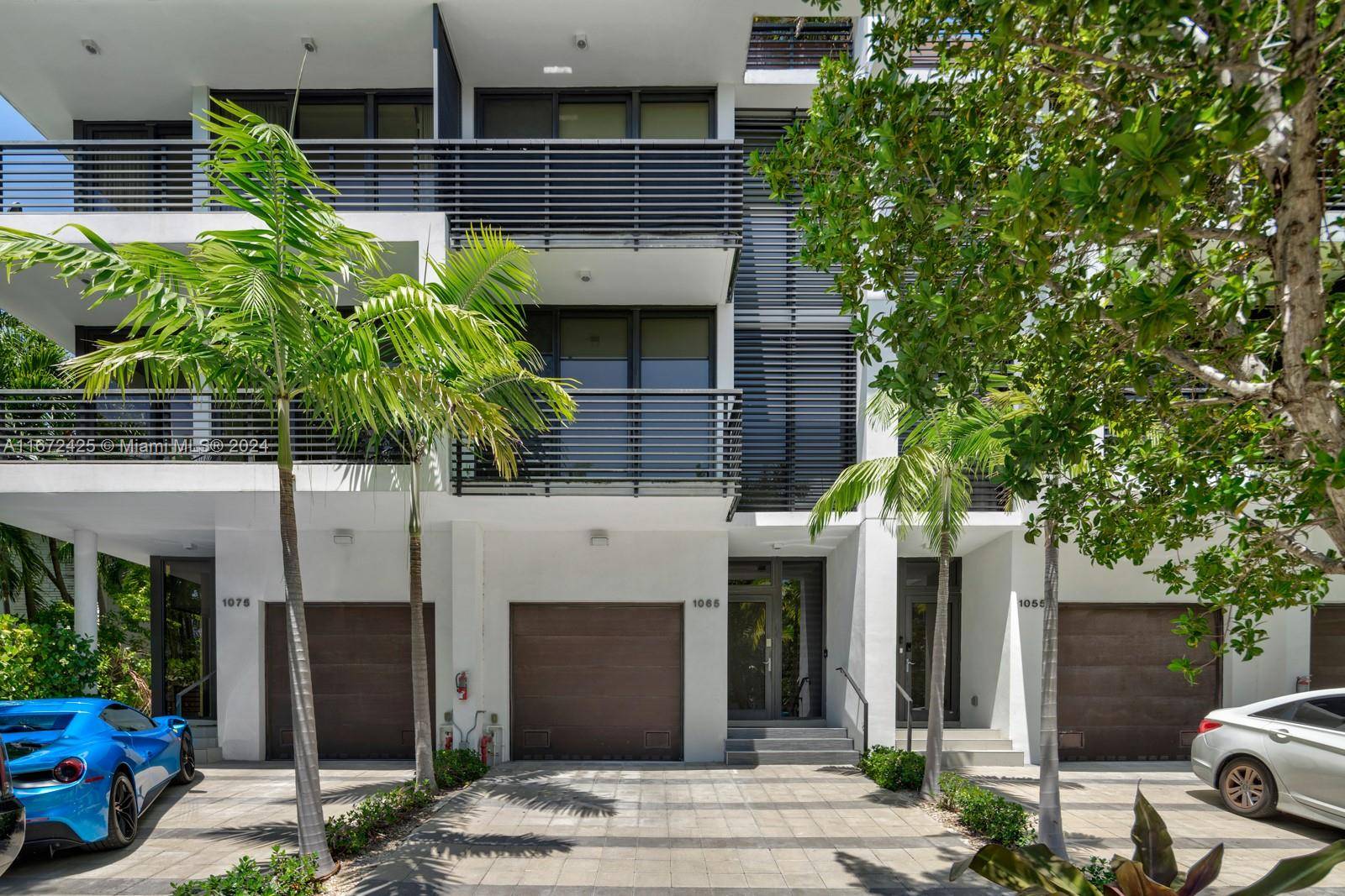 This stunning luxury townhome located in the heart of Miami s ultra desirable Bay Harbor Island, is now available !