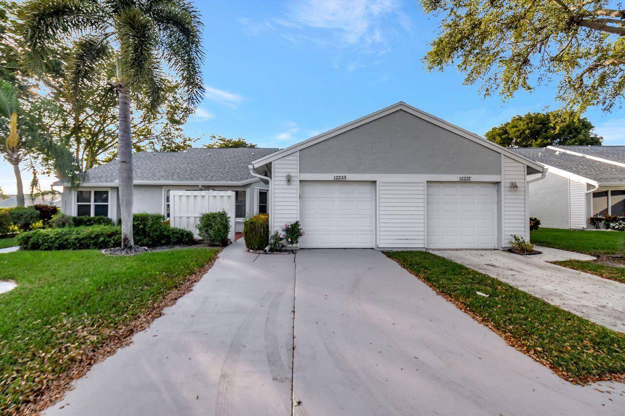 This approximately 1, 270 square foot villa features two bedrooms and two full bathrooms with a one car garage.