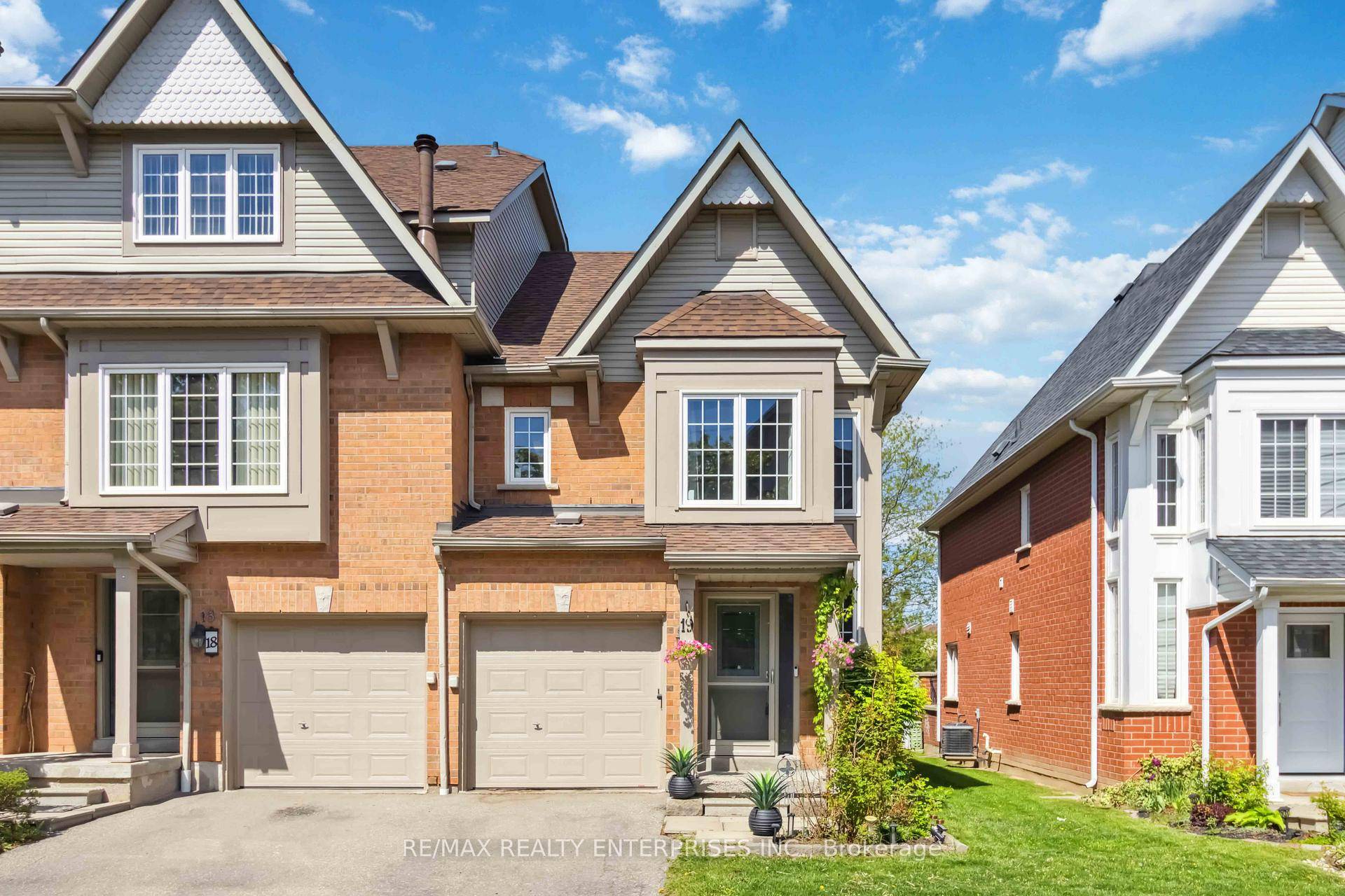 Welcome to this beautifully updated end unit townhome, perfectly situated in a sought after area and partially backing onto a large field.
