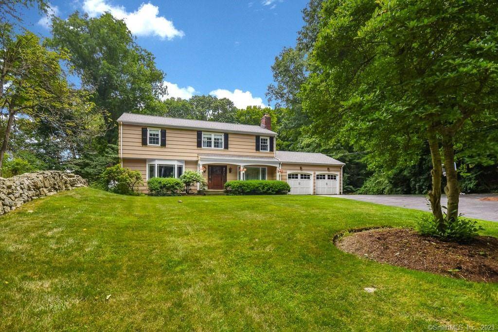 Light and welcoming, completely renovated yet still traditional, New England colonial on lovely North Stamford's Wildwood Road.