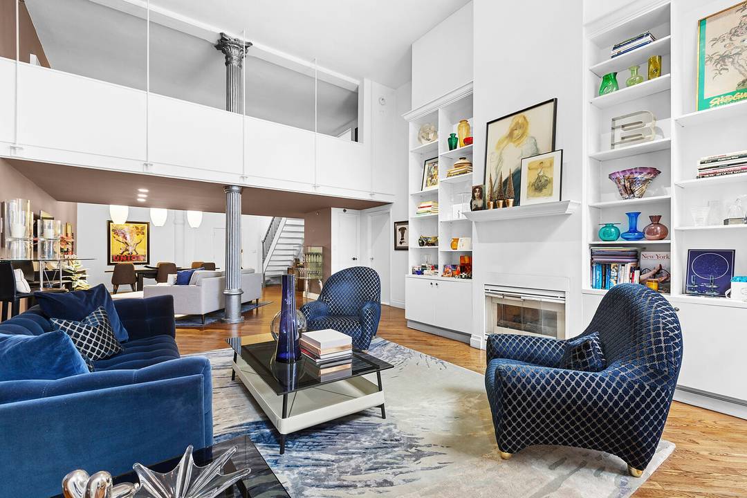 Residence 2D at 121 West 20th Street is a striking two bedroom, two bathroom duplex loft that captures the essence of classic Chelsea living.