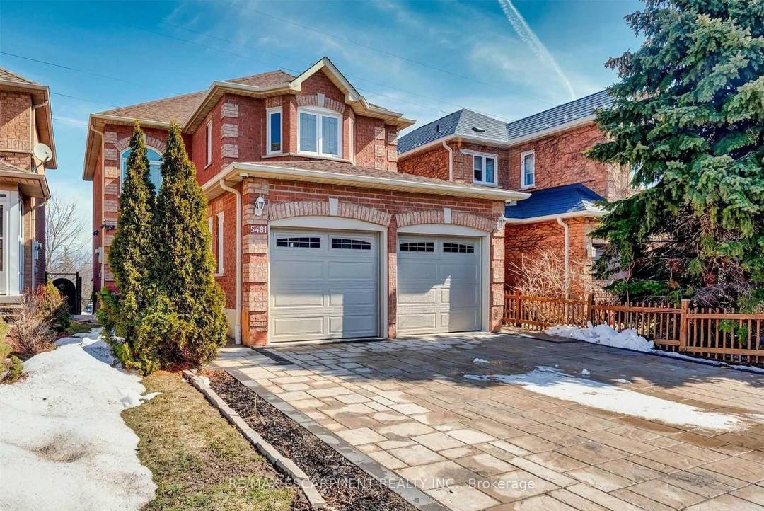 Welcome to this beautifully maintained family home nestled in the heart of Mississauga's desirable Hurontario neighborhood.