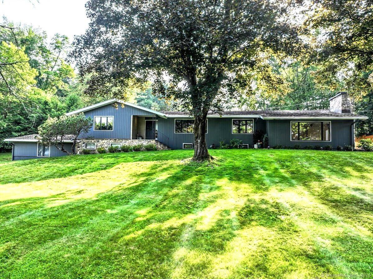 Nestled on a serene cul de sac in Brookfield, CT, this beautifully remodeled 9 room home offers modern comfort, timeless charm, and a spacious, open concept floor plan designed for ...