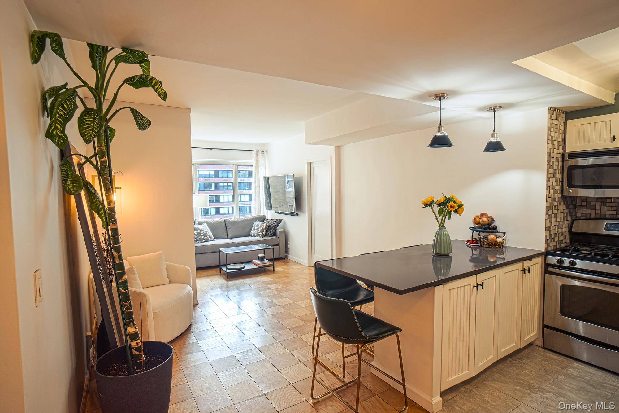 A sophisticated and modernly designed one bedroom with a true bonus room !