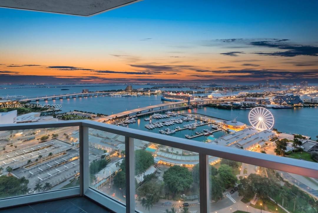 Experience luxury living in this stunning high floor residence featuring breathtaking bay and city views from 2 private balconies.