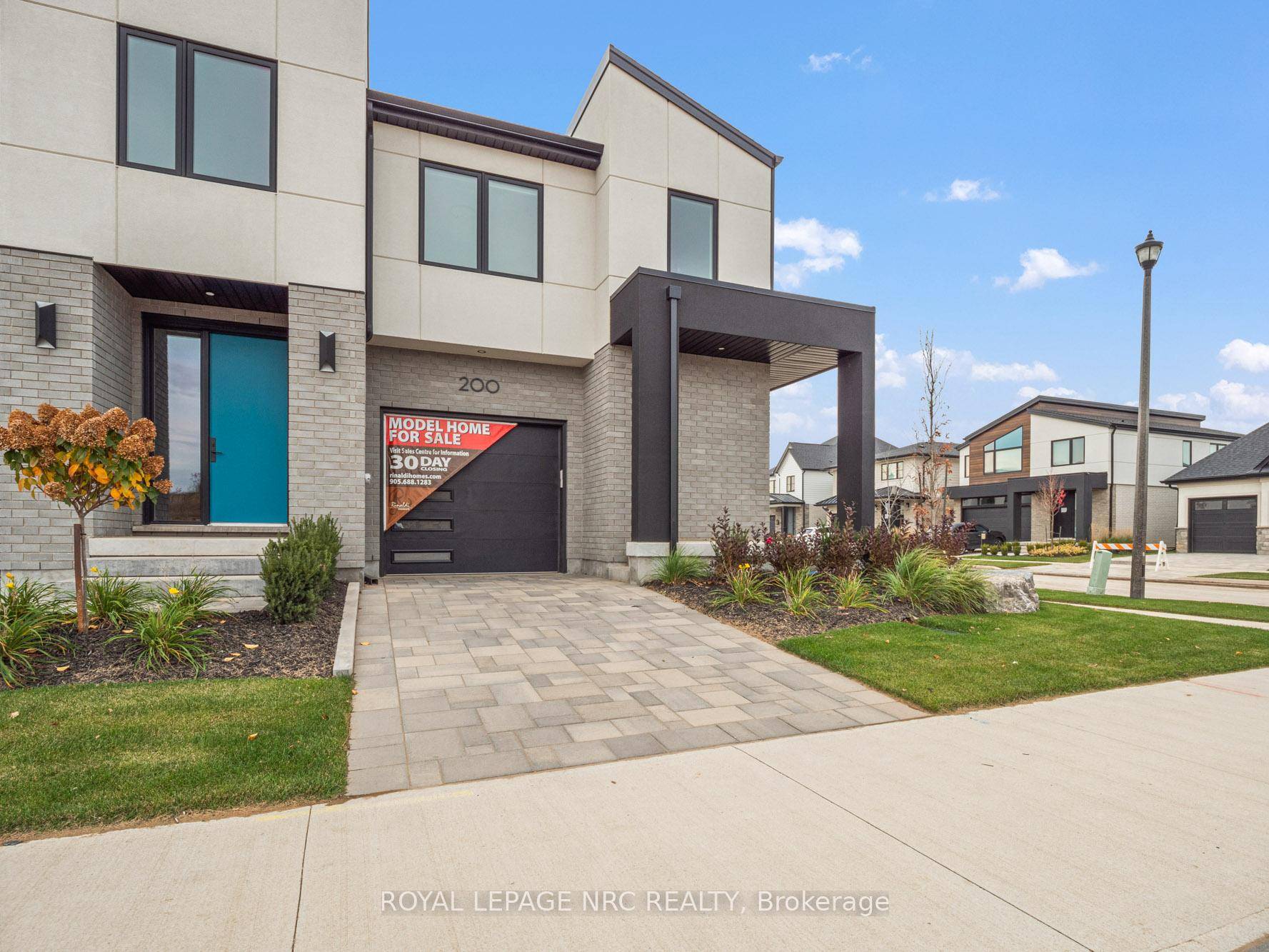 Welcome to 200 Klager Ave a breathtaking 2005 sq ft freehold corner unit townhome.