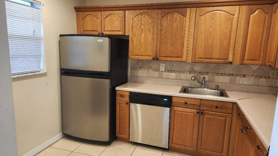 nice clean unit with 2nd bedroom wall just added back updated master bath, tiled and carpet, screened patio, has hurricane shutters a storage lockernew ac unit and new electrical panel ...