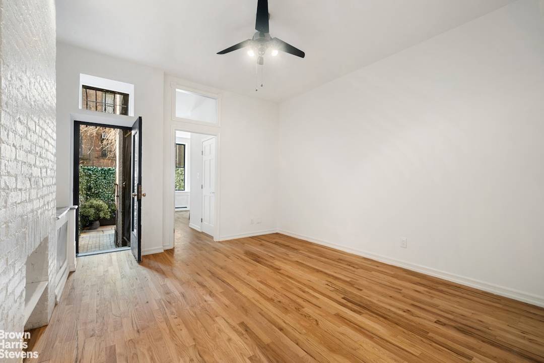 YOUR OWN SECRET GARDEN Wonderfully affordable two bedroom apartment with two full bathrooms and your own secret garden, perfectly situated in the vibrant heart of Hell's Kitchen.